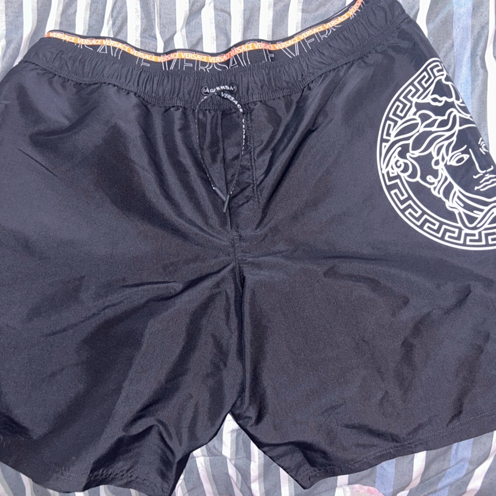 Versace swim trunks never worn